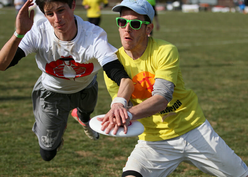 Two players go for the disc at the 2013 Fools Fest.