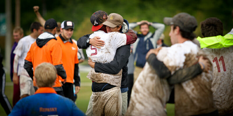 Florida State coach Peter van de Burgt embraces a player after they defeated Florida to make it to Nationals.