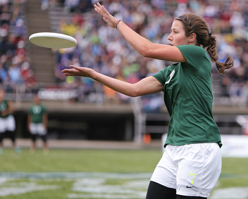 Oregon's Alex Ode catches the disc in front of the Madison crowd.