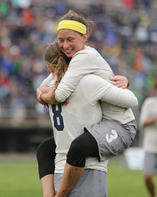 Carleton celebrates after clinching a spot in the D-I College Championship finals.