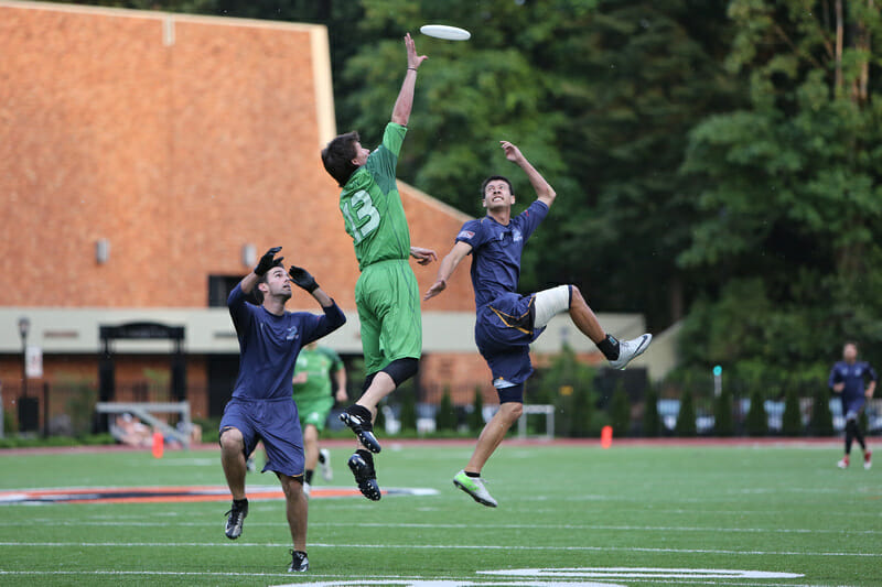 The Portland Stags' Timmy Perston goes up for the grab between two San Francisco Dogfish defenders.