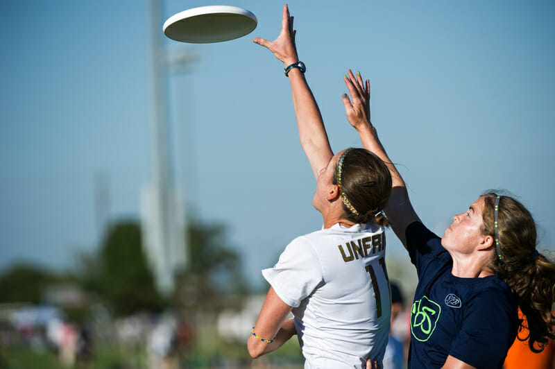 Scandal's Kirsten Unfried wins a race to the disc against Brute Squad
