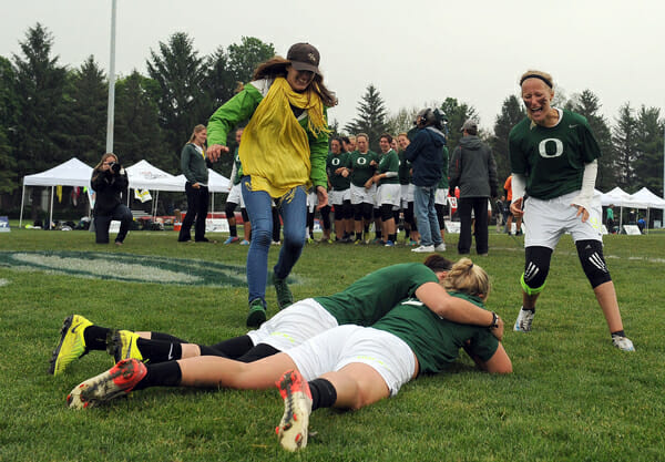 Oregon players embrace after winning the 2013 College National Championships.