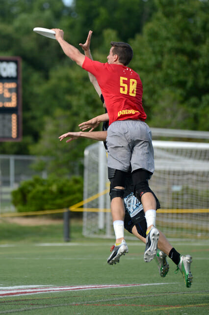 San Francisco Revolver's Beau Kittredge reels in the game winning catch over Boston Ironside's Peter Prial at the 2013 US Open. Photo: Brandon Wu -- UltiPhotos.com