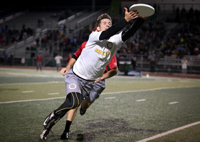 Ashlin Joye reaches for the disc at the 2013 Club Championships.