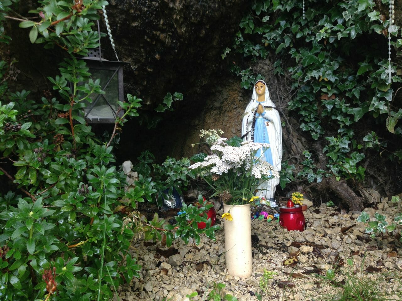 A shrine in the side of the mountain.