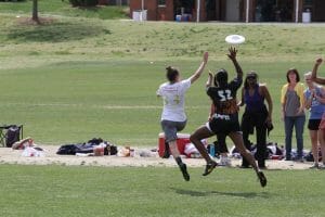 Wake Forest's Amanda Murphy and Elon's Sydney Harris vie for a disc in the AC DIII Regional Final