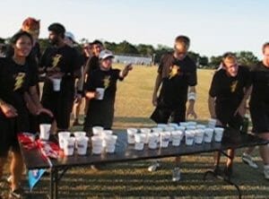 Seattle Shazam participate in a boat race on the field after winning the 2004 Club Championships.